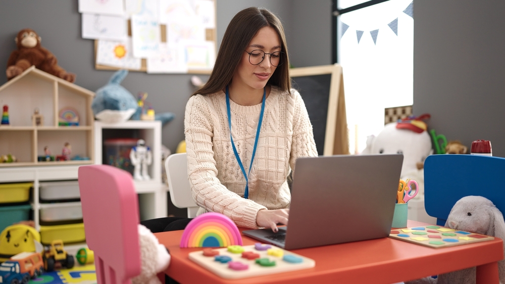 Teacher on laptop doing Thrive training